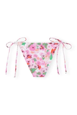 Shop GANNI Bedruckte String-Bikinihose Sugar Plum