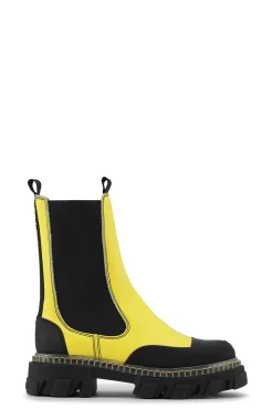 Shop GANNI Cleated Mid Chelsea Boot Transparent Welt Lemon Zest